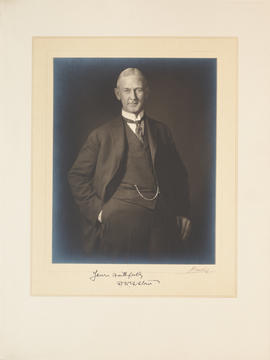 Portrait of F. N. G. Starr, 3/4 length, standing, full face, left hand in pocket